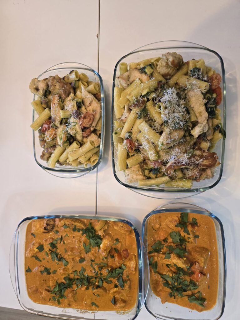 Chef-prepared meal prep portions in containers by Meals with Chef